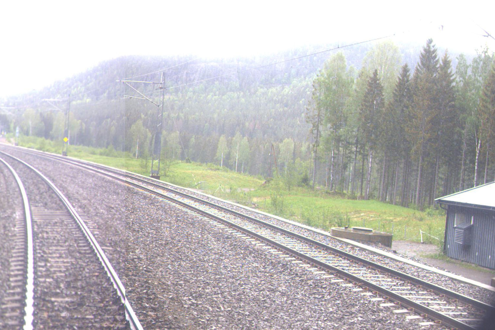 Tracks and building at Jensrud station