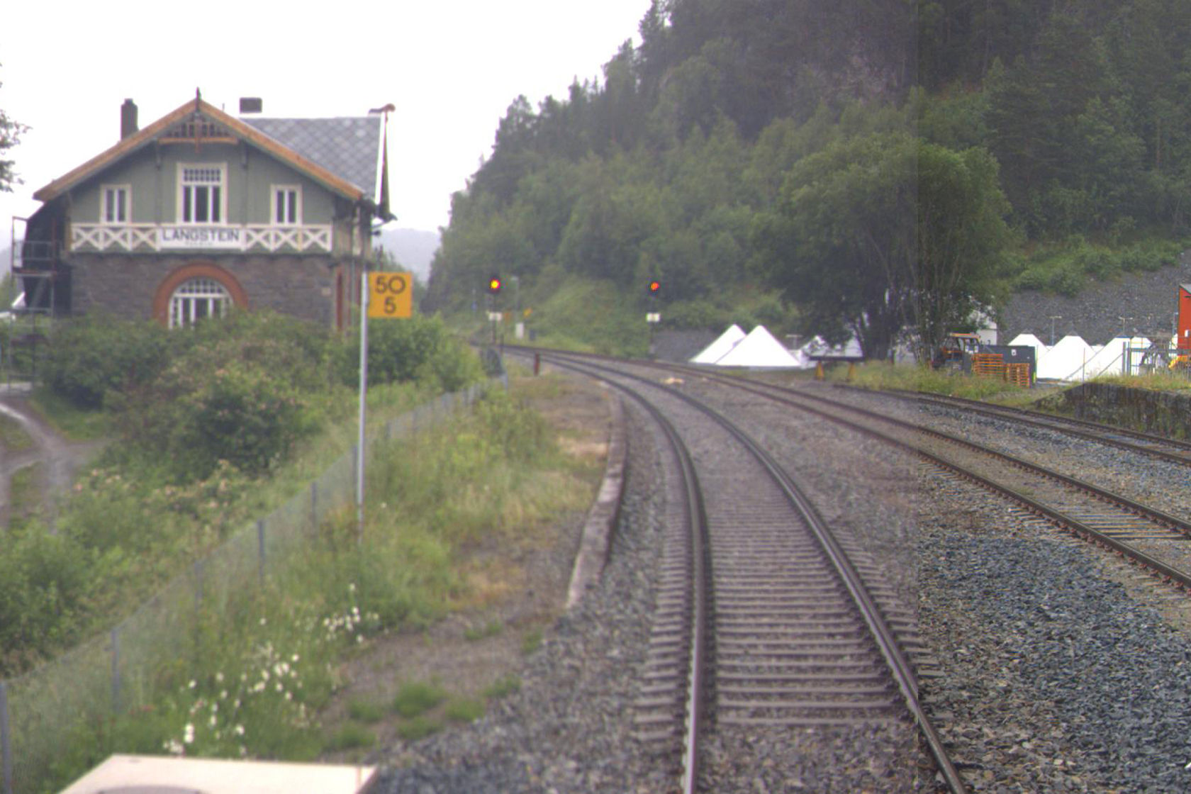 Tracks and station building at Langstein station