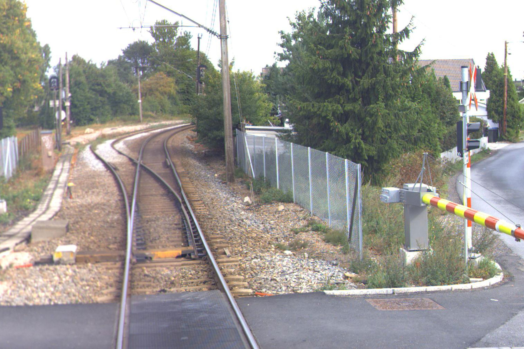 Tracks and level crossing at Lisleby station