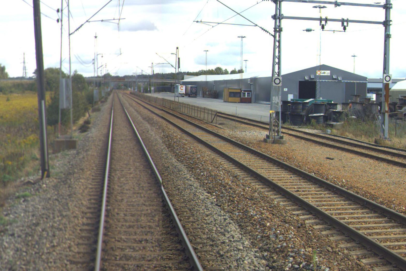 Tracks and building at Rolvsøy station