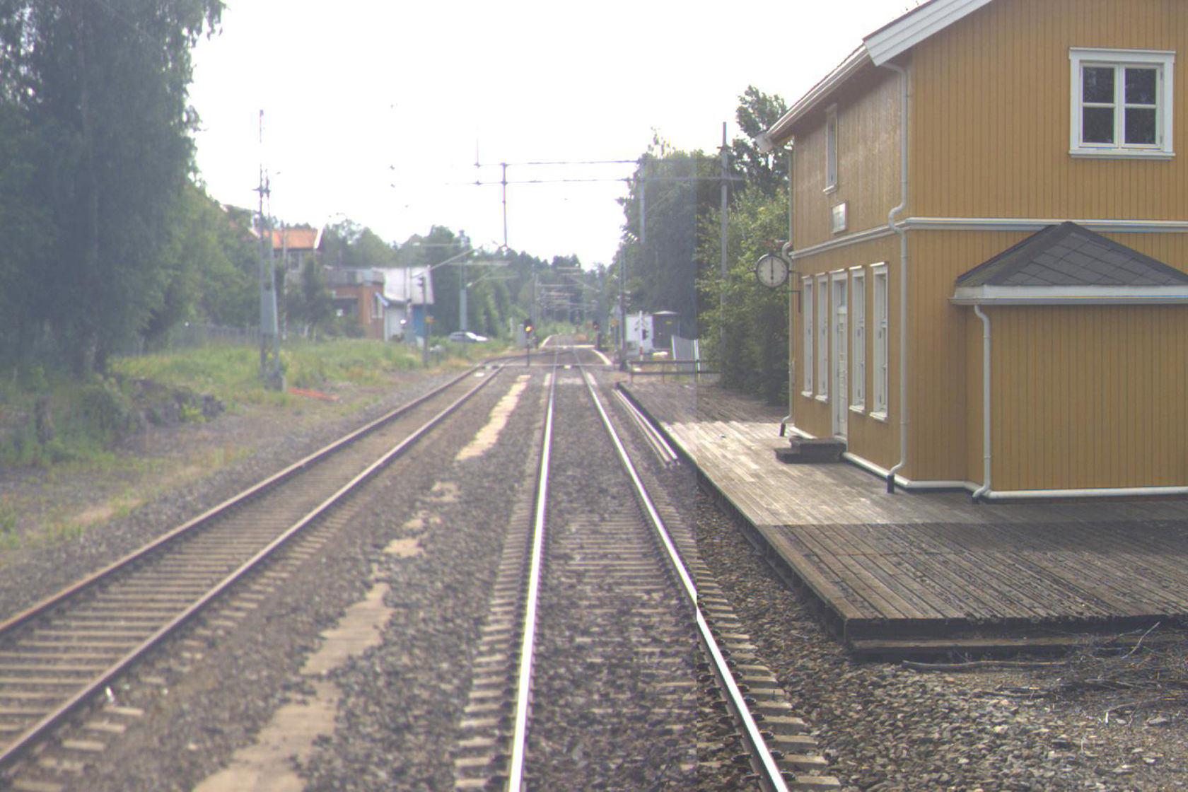 Tracks and station building at Skotterud station